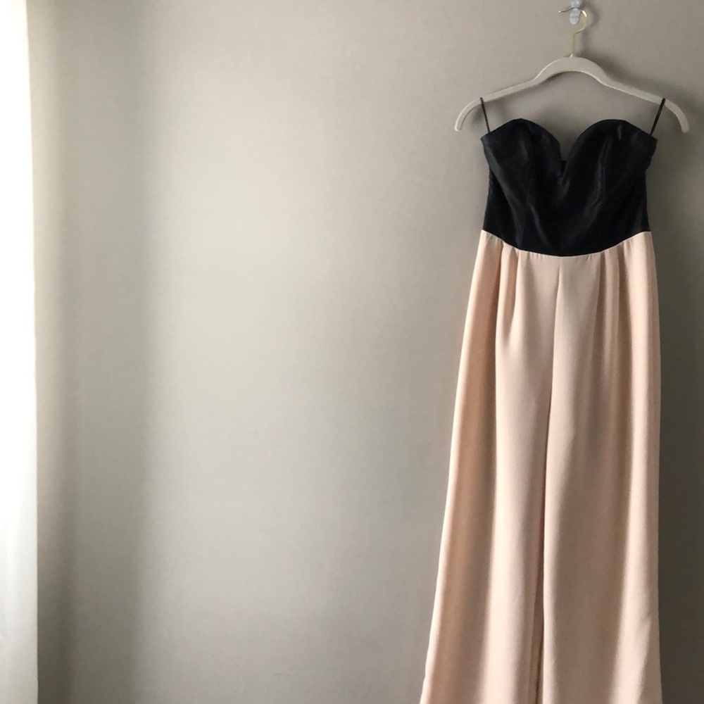 Strapless jumpsuit with faux leather top